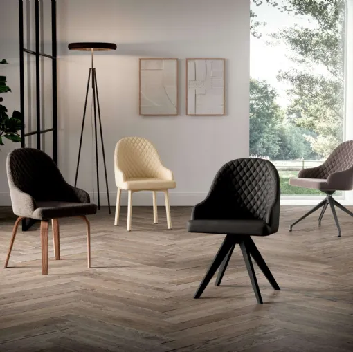 Sedia Demetra in pelle o tessuto di Ozzio