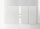 Armadio dispensa in essenza natural wood con ante complanari di Caccaro