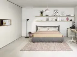 Cameretta componibile con letto matrimoniale in tessuto imbottito, scrivania e mensole Next space 08 di Nidi