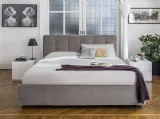 Letto con testiera trapuntata e contenitore Monterey di Calligaris