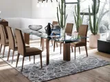 Sedia in pelle con schienale alto e struttura in legno massello Bess di Calligaris