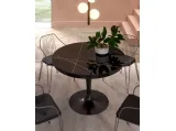Tavolo rotondo allungabile Eclipse con top in marble glass Sahara Noir Lucido di Ozzio