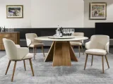 Tavolo rotondo con piano in ceramica e basamento in legno Icaro di Calligaris